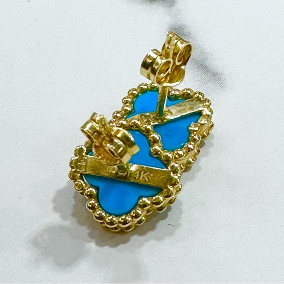 14k yellow gold stud earrings with torques - Picture 2 of 3